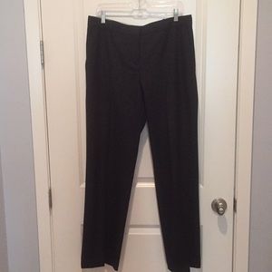 Black slacks with white dots